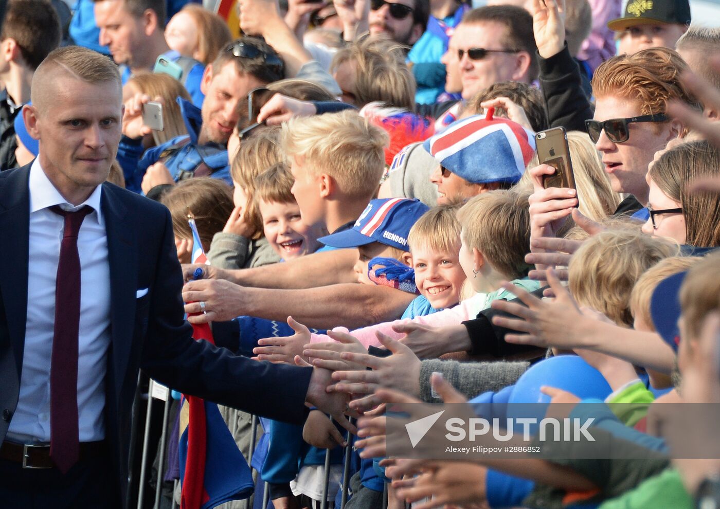 Icelandic national football team greeted by fans after returning from Euro 2016