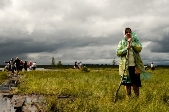 Religious procession to Svyatoye Lake in Menyusha village, Novgorod Region