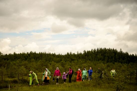 Religious procession to Svyatoye Lake in Menyusha village, Novgorod Region