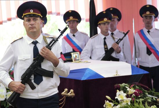 Paying last respects to Russian military pilot Yevgeny Dolgin killed in Syria