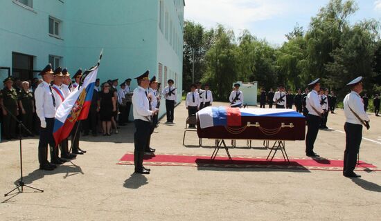 Paying last respects to Russian military pilot Yevgeny Dolgin killed in Syria