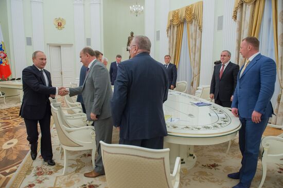 President Vladimir Putin meets with Duma group leaders