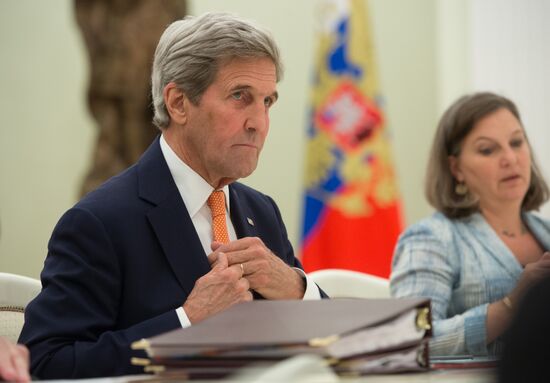 Vladimir Putin meets with US Secretary of State John Kerry