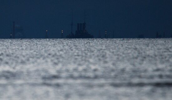 Cruiser Aurora towed to permanent mooring at Petrovskaya Embankment