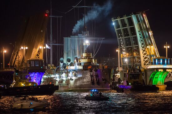 Cruiser Aurora towed to permanent mooring at Petrovskaya Embankment