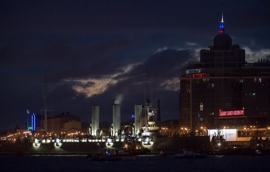 Cruiser Aurora towed to permanent mooring at Petrovskaya Embankment