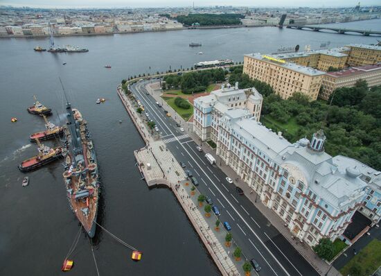 Cruiser Aurora towed to permanent mooring at Petrovskaya Embankment
