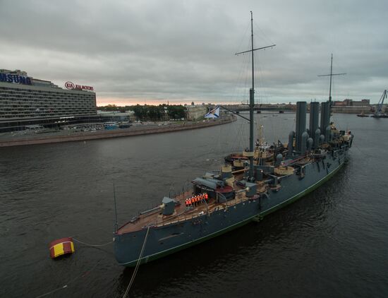 Cruiser Aurora towed to permanent mooring at Petrovskaya Embankment