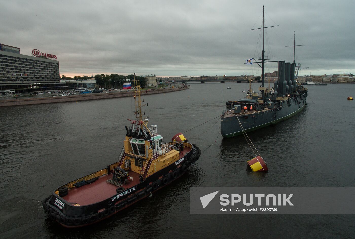 Cruiser Aurora towed to permanent mooring at Petrovskaya Embankment