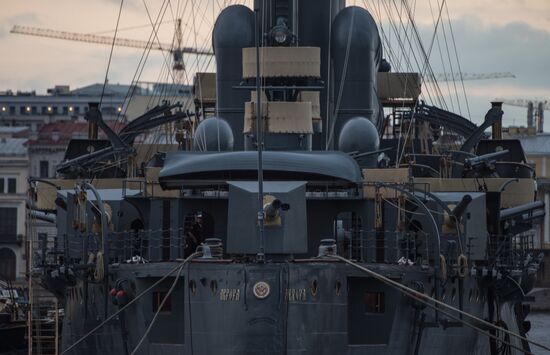 Cruiser Aurora towed to permanent mooring at Petrovskaya Embankment