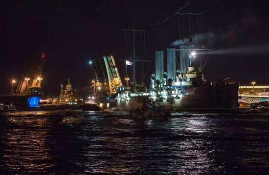 Cruiser Aurora towed to permanent mooring at Petrovskaya Embankment