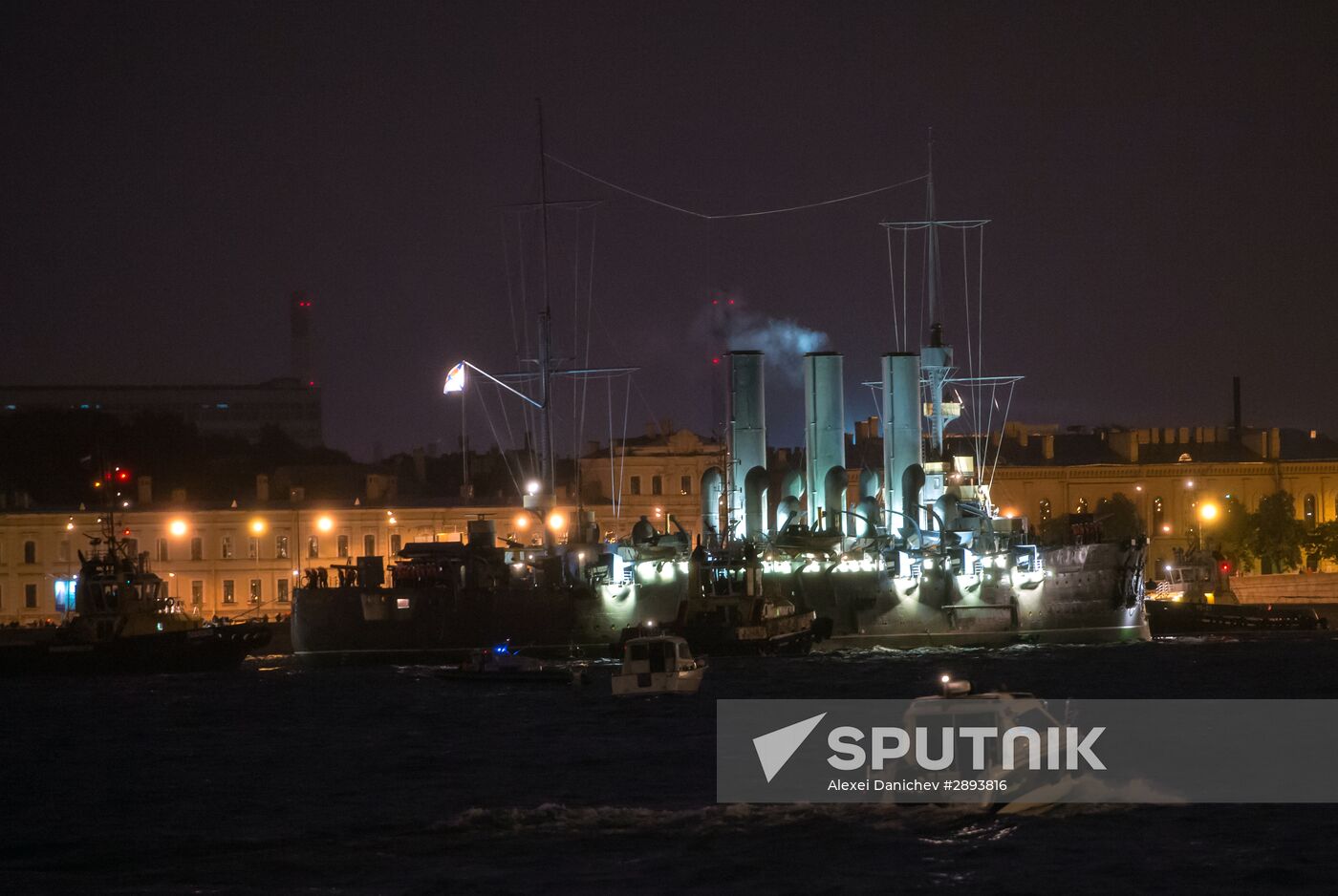 Cruiser Aurora towed to permanent mooring at Petrovskaya Embankment