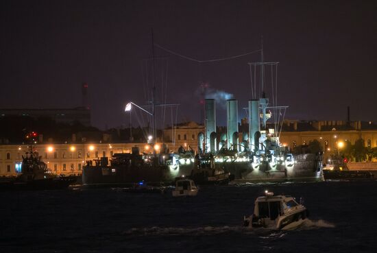 Cruiser Aurora towed to permanent mooring at Petrovskaya Embankment