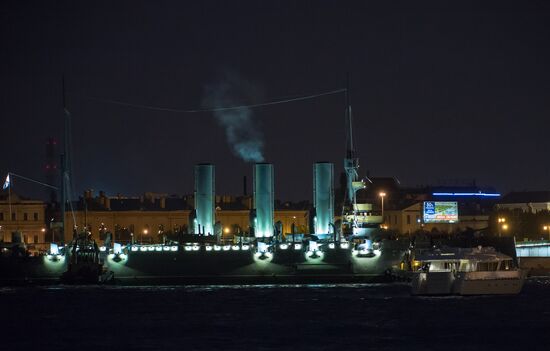 Cruiser Aurora towed to permanent mooring at Petrovskaya Embankment