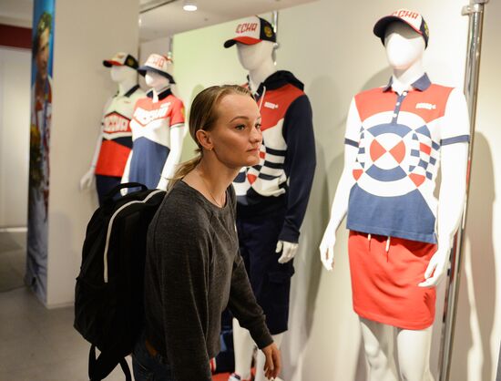 Russian Olympic track and field and freestyle wrestling teams receive outfits for 2016 Olympics