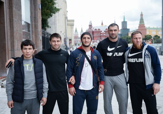 Russian Olympic track and field and freestyle wrestling teams receive outfits for 2016 Olympics