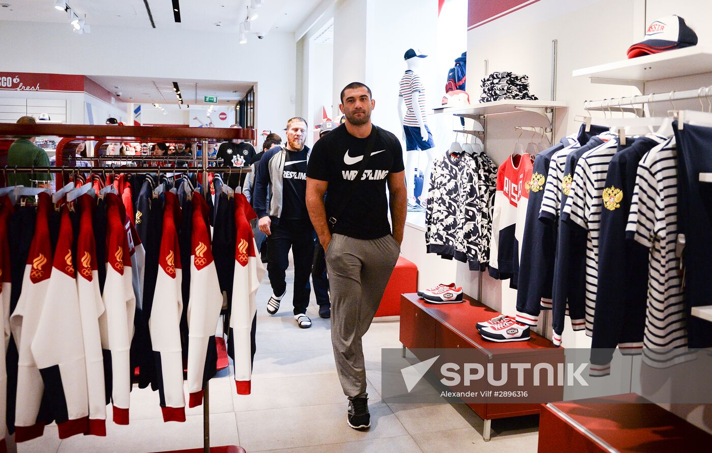 Russian Olympic track and field and freestyle wrestling teams receive outfits for 2016 Olympics