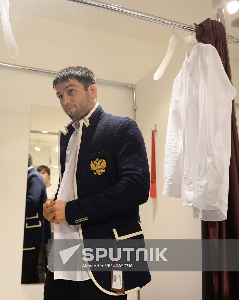 Russian Olympic track and field and freestyle wrestling teams receive outfits for 2016 Olympics