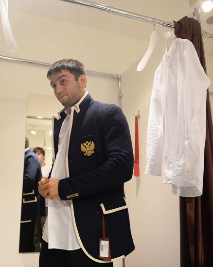 Russian Olympic track and field and freestyle wrestling teams receive outfits for 2016 Olympics