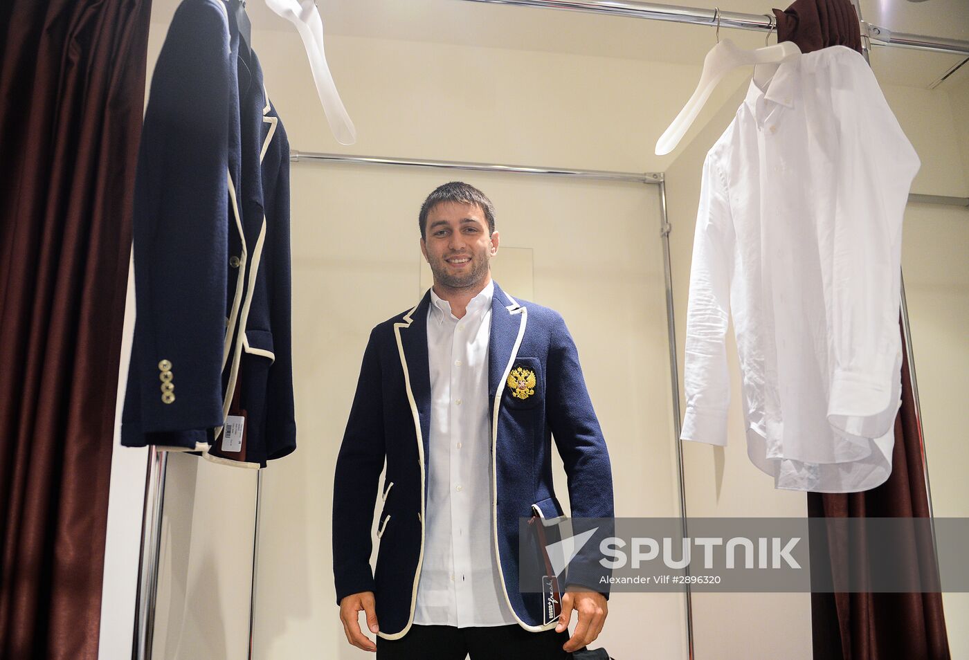 Russian Olympic track and field and freestyle wrestling teams receive outfits for 2016 Olympics
