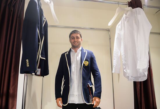 Russian Olympic track and field and freestyle wrestling teams receive outfits for 2016 Olympics