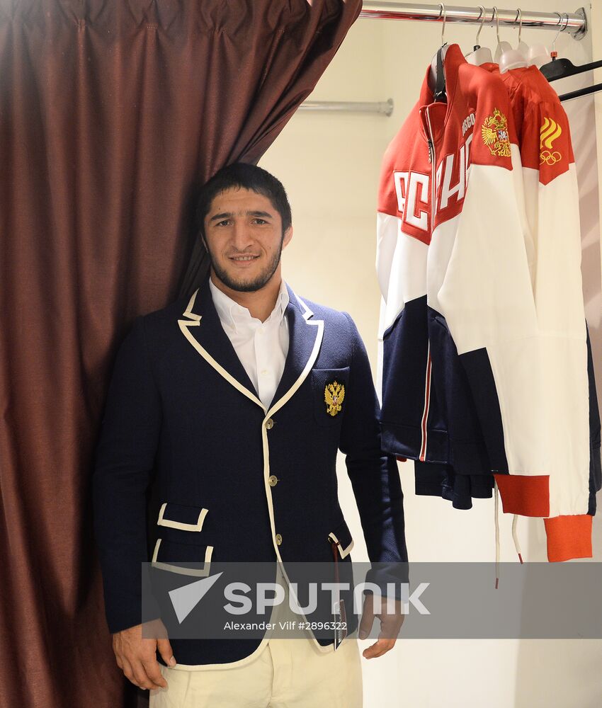 Russian Olympic track and field and freestyle wrestling teams receive outfits for 2016 Olympics