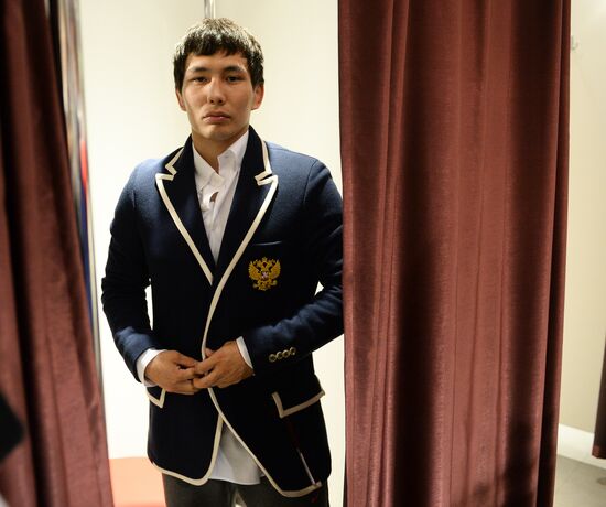 Russian Olympic track and field and freestyle wrestling teams receive outfits for 2016 Olympics