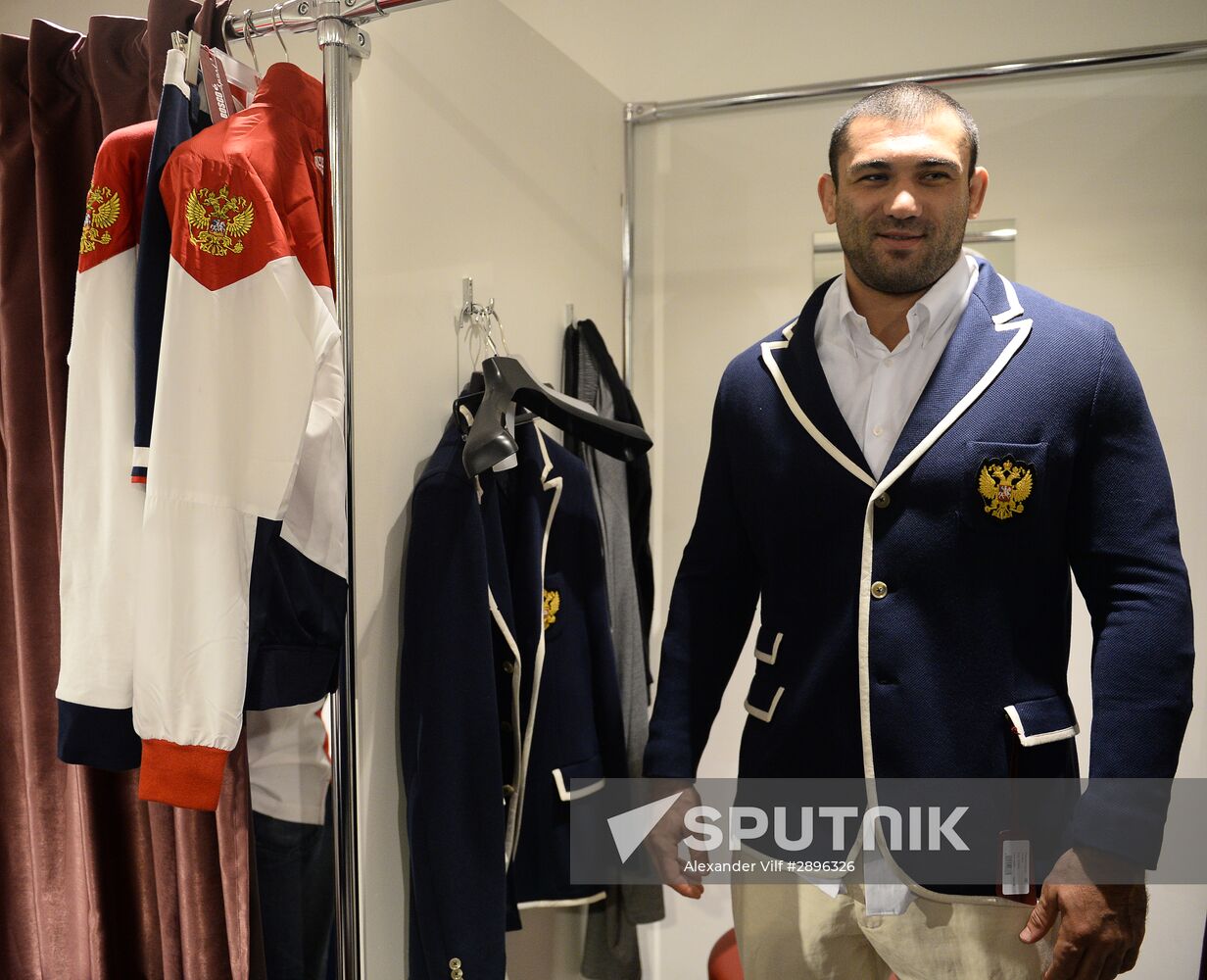 Russian Olympic track and field and freestyle wrestling teams receive outfits for 2016 Olympics