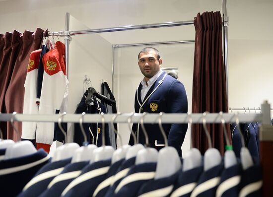 Russian Olympic track and field and freestyle wrestling teams receive outfits for 2016 Olympics