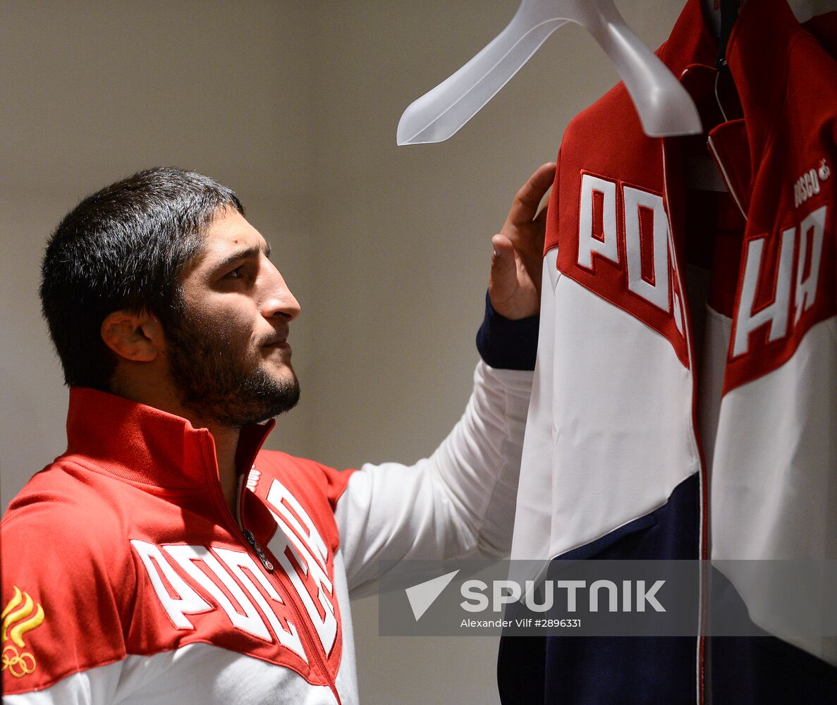 Russian Olympic track and field and freestyle wrestling teams receive outfits for 2016 Olympics