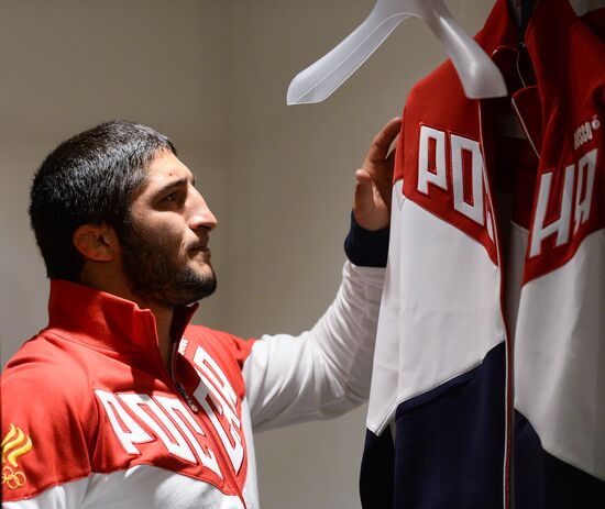 Russian Olympic track and field and freestyle wrestling teams receive outfits for 2016 Olympics