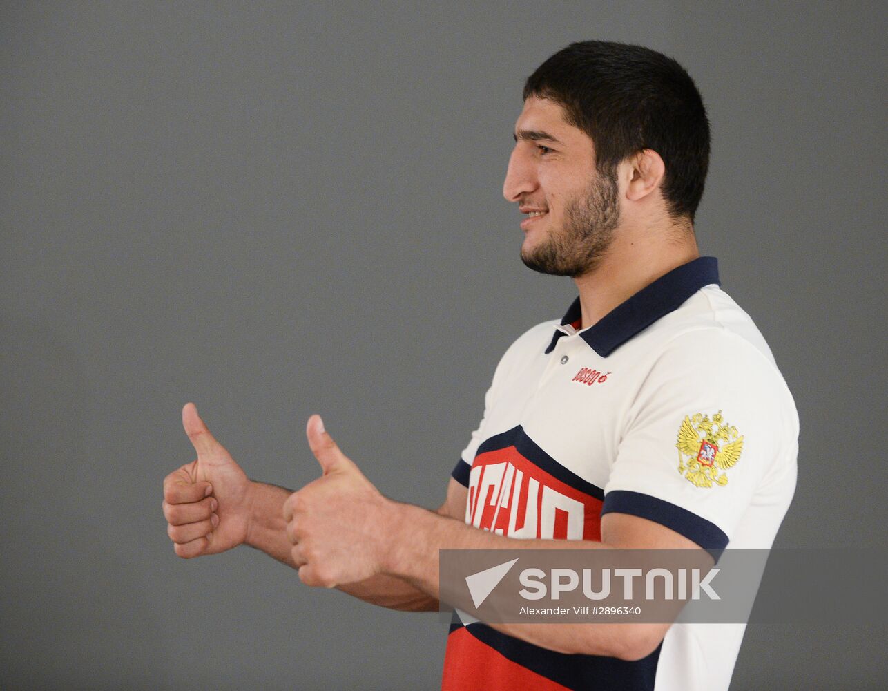 Russian Olympic track and field and freestyle wrestling teams receive outfits for 2016 Olympics