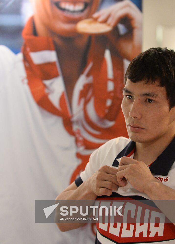Russian Olympic track and field and freestyle wrestling teams receive outfits for 2016 Olympics