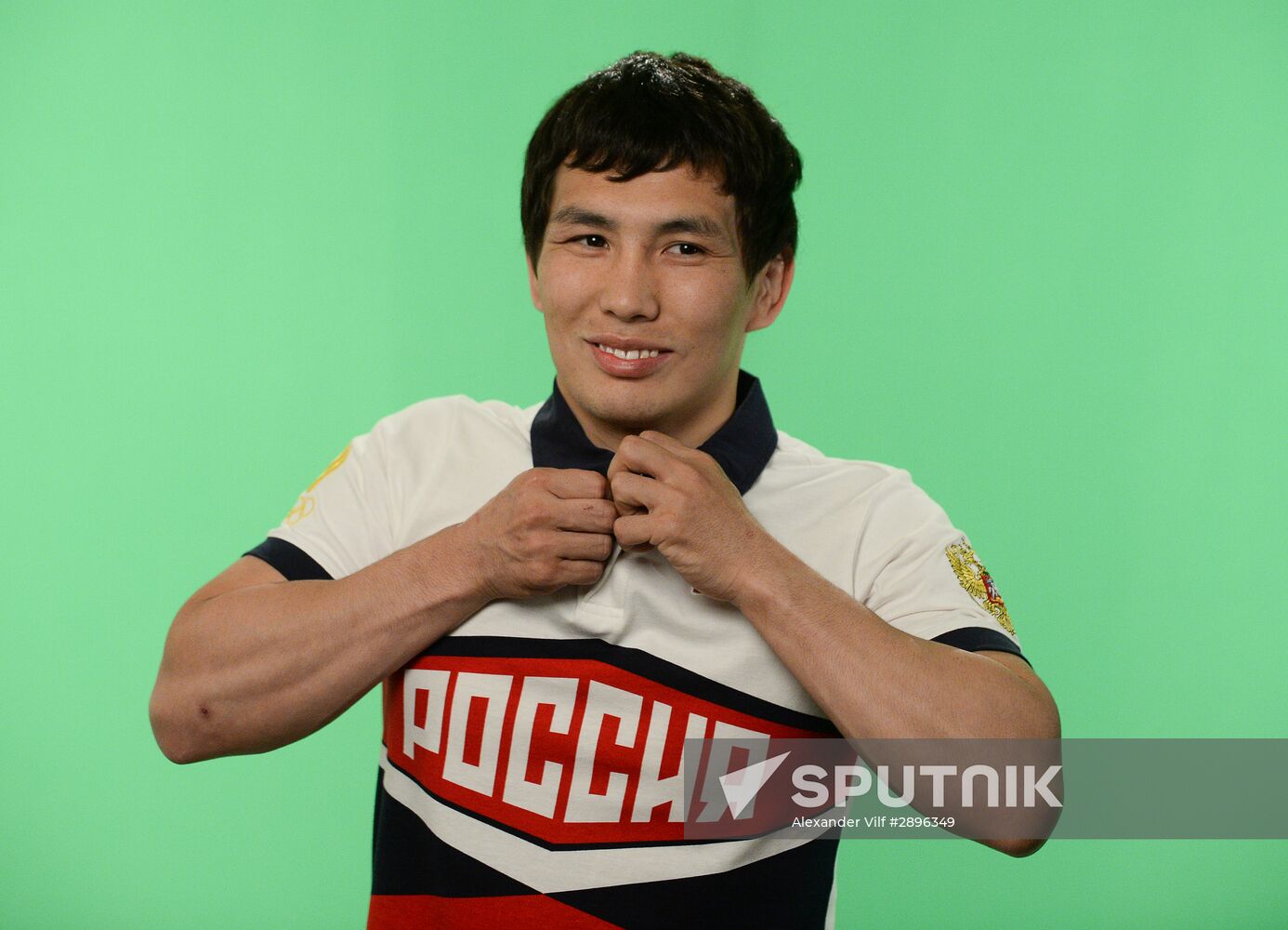 Russian Olympic track and field and freestyle wrestling teams receive outfits for 2016 Olympics