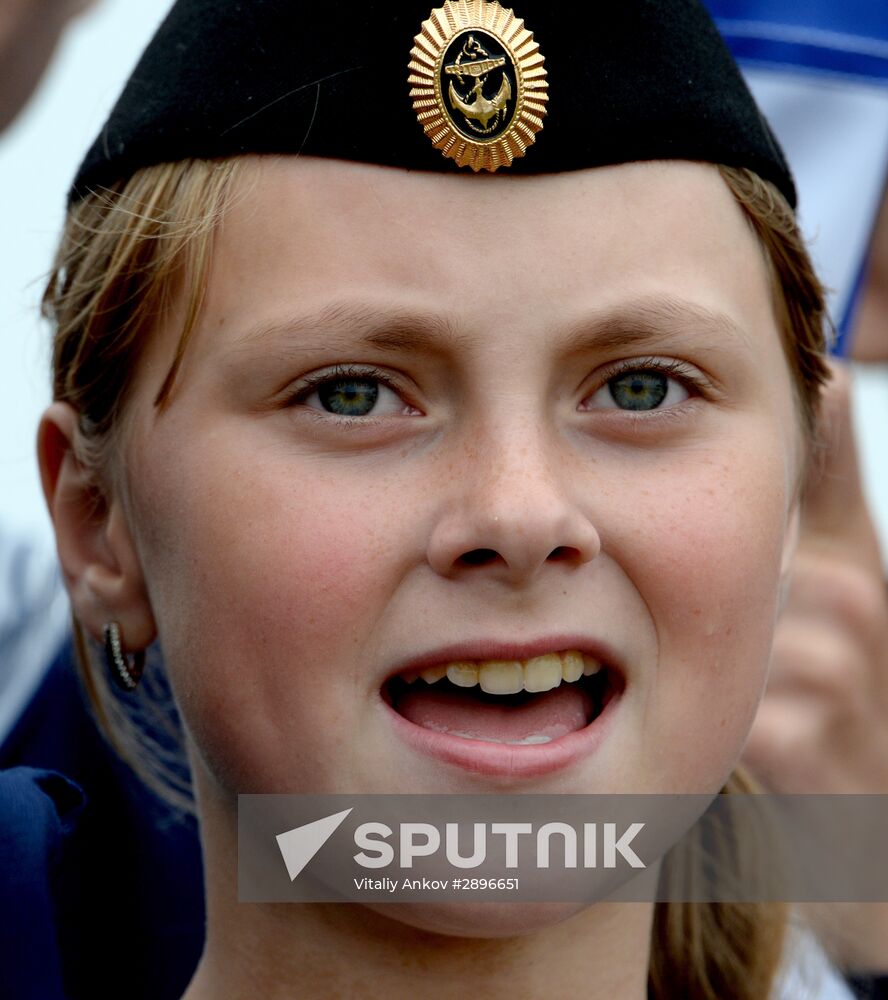 Children at Okean camp take oath