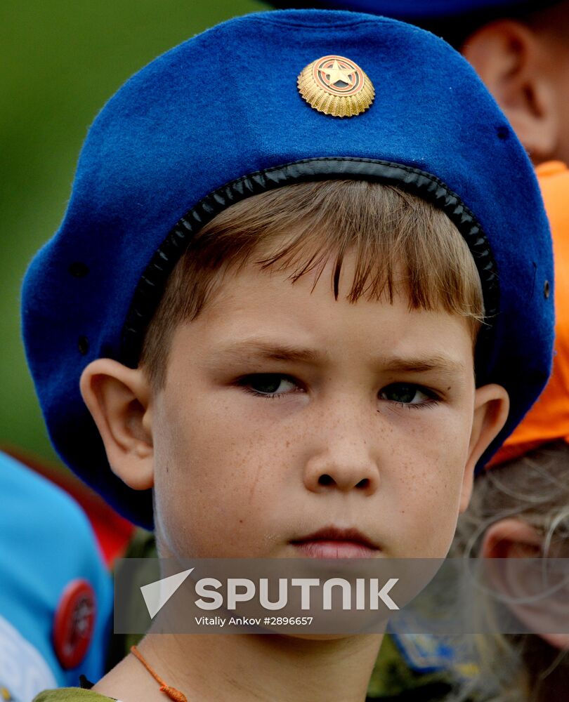 Children at Okean camp take oath