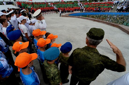 Children at Okean camp take oath