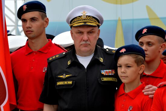Children at Okean camp take oath