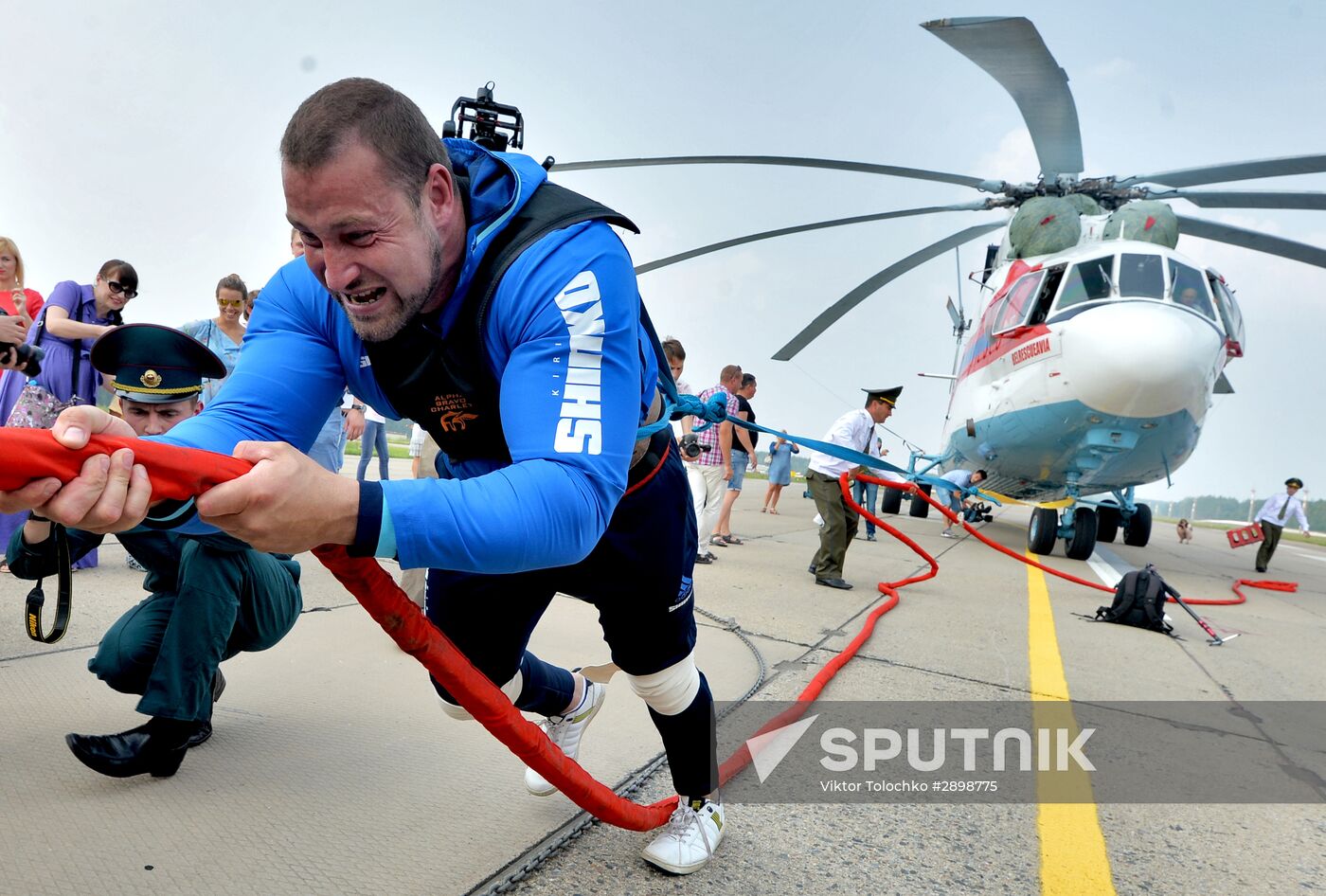 Strongman Kirill Shimko moves helicopter