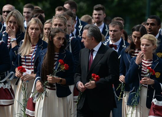 Russian Olympic team lay flowers at Eternal Flame in Alexander Garden