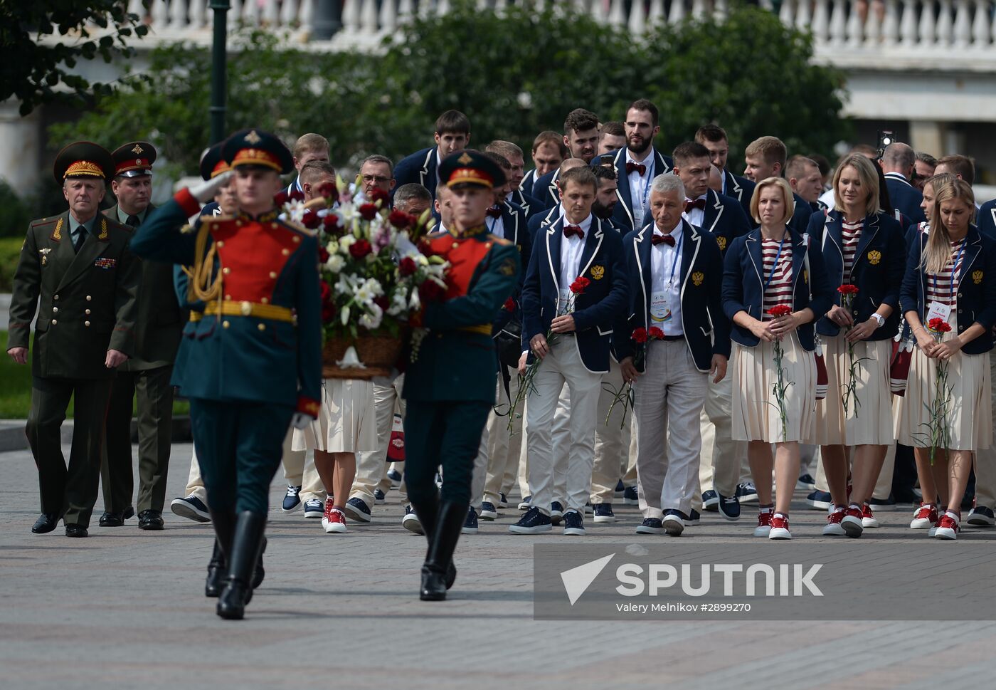 Russian Olympic team lay flowers at Eternal Flame in Alexander Garden