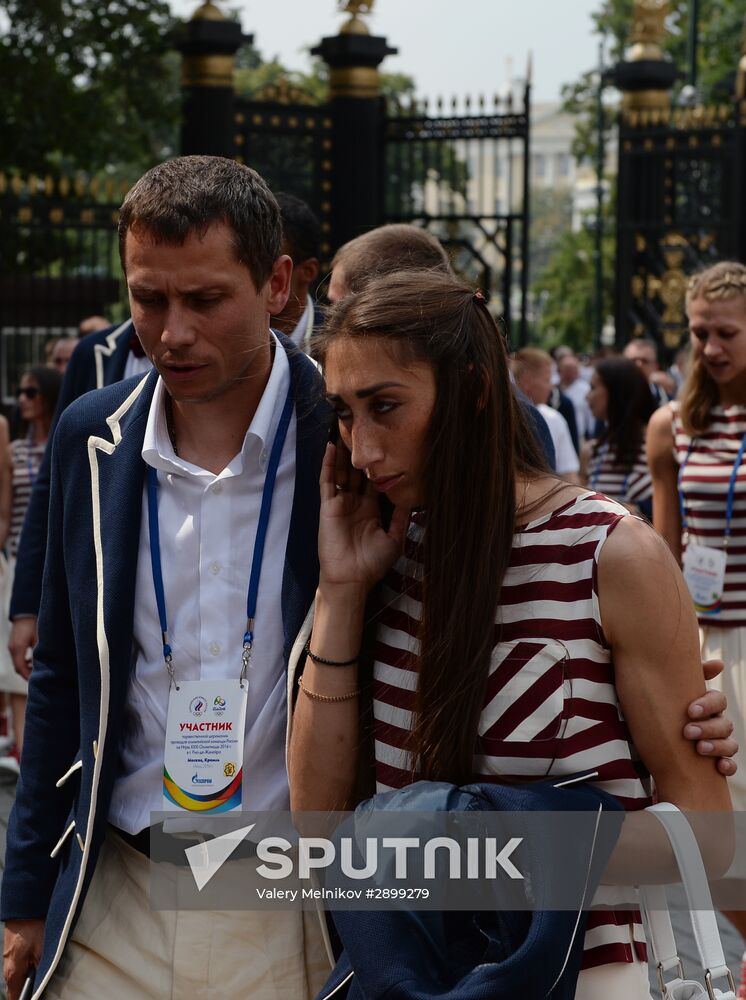 Russian Olympic team lay flowers at Eternal Flame in Alexander Garden