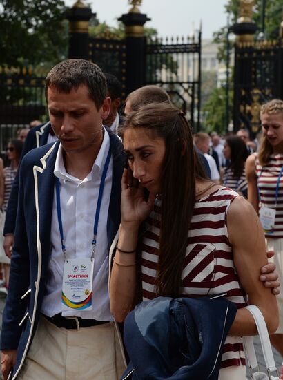 Russian Olympic team lay flowers at Eternal Flame in Alexander Garden