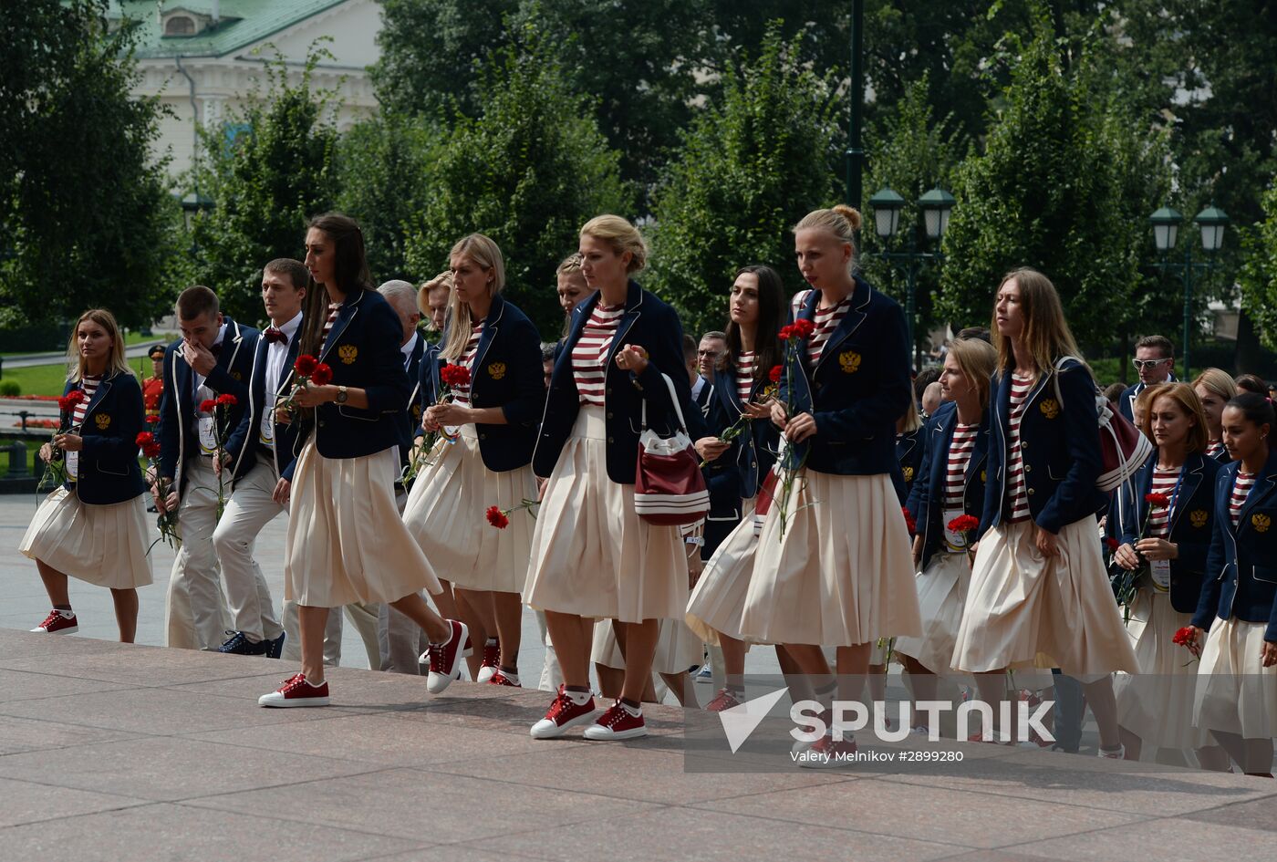 Russian Olympic team lay flowers at Eternal Flame in Alexander Garden