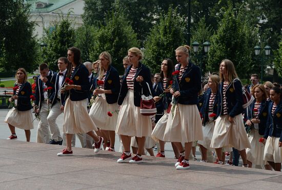 Russian Olympic team lay flowers at Eternal Flame in Alexander Garden