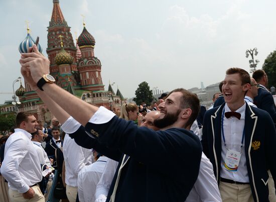 Russian Olympic team lay flowers at Eternal Flame in Alexander Garden