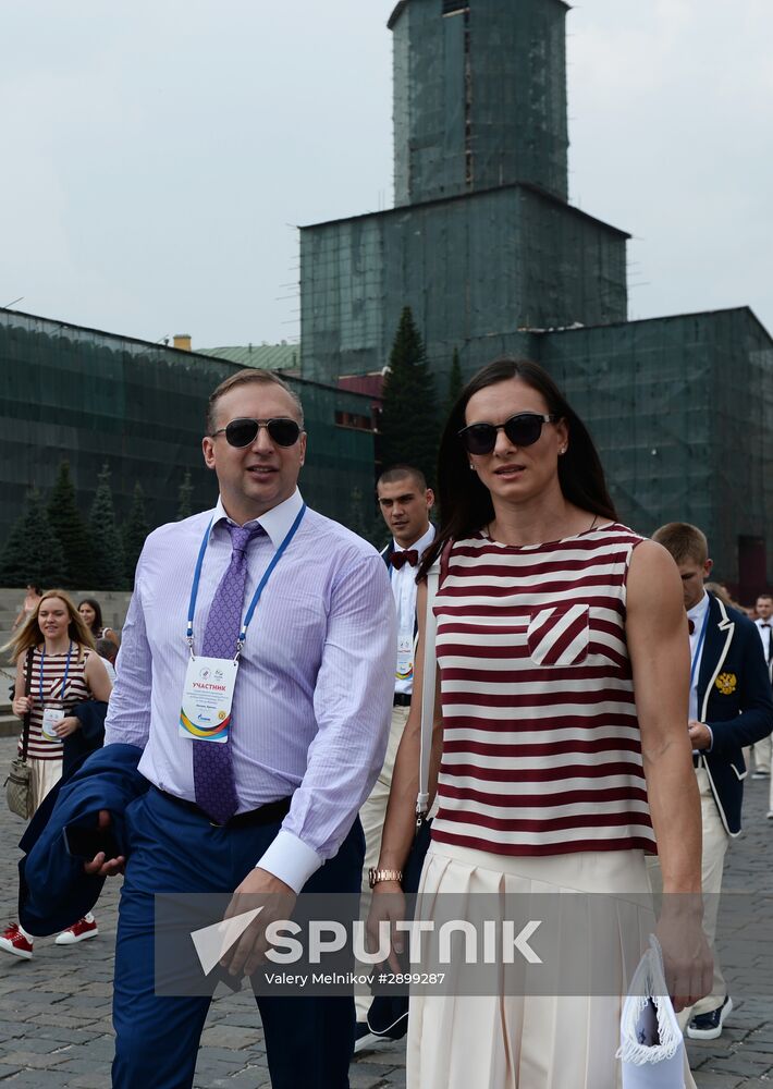 Russian Olympic team lay flowers at Eternal Flame in Alexander Garden