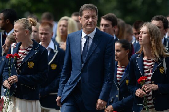 Russian Olympic team lay flowers at Eternal Flame in Alexander Garden