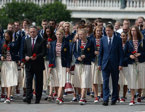 Russian Olympic team lay flowers at Eternal Flame in Alexander Garden
