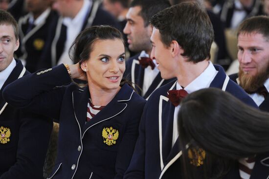 President Vladimir Putin meets with national Olympic team in Kremlin